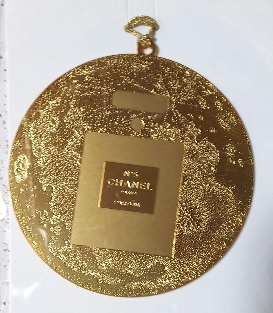 Chanel Seasonal gold Metal charm logo collectable
