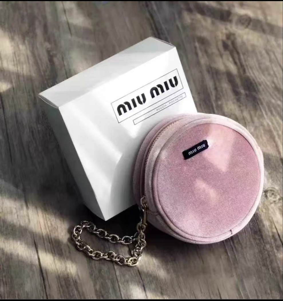 Miumiu pink round Pouch Bag with handstrap