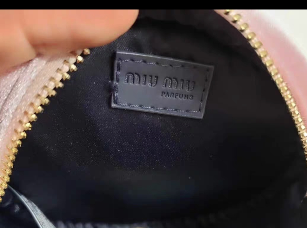 Miumiu pink round Pouch Bag with handstrap