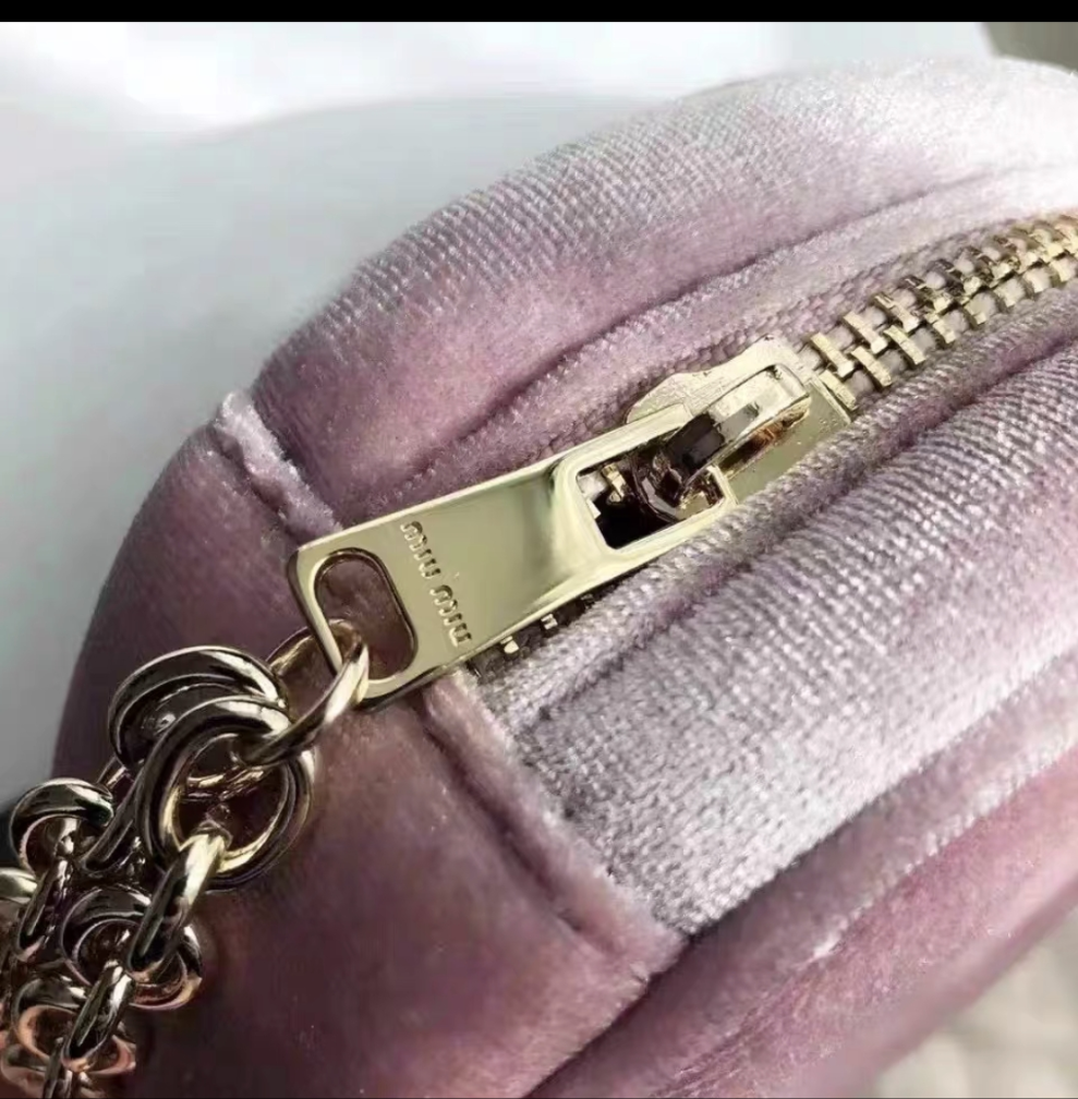 Miumiu pink round Pouch Bag with handstrap