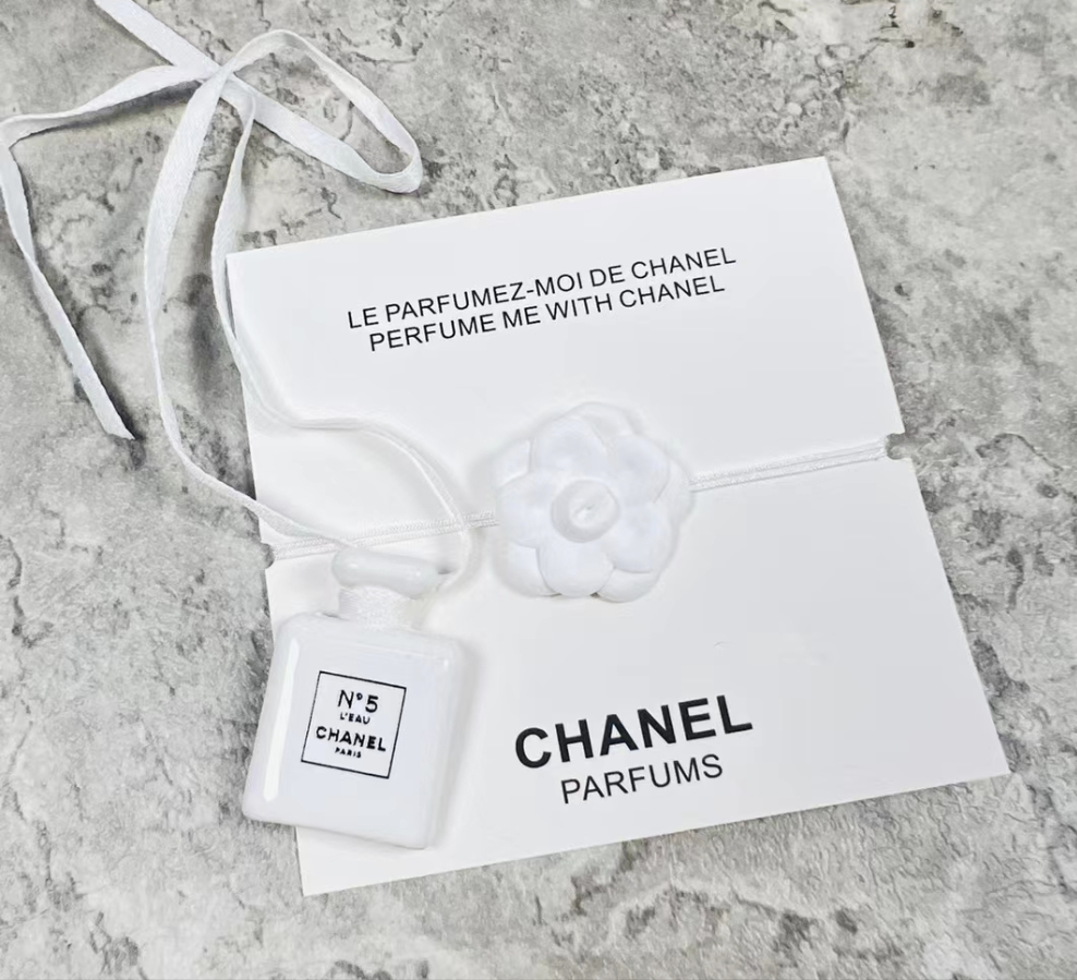 Chanel perfume bottle camellia string bracelet diffuser VIP gift