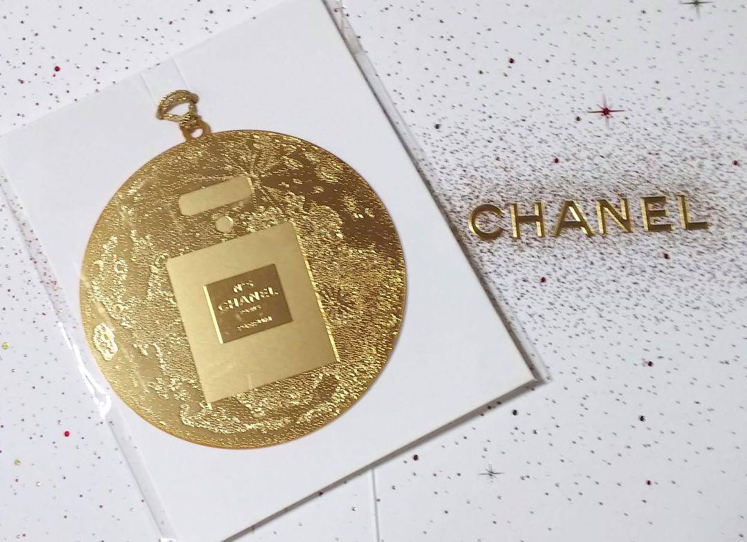 Chanel Seasonal gold Metal charm logo collectable