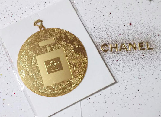Chanel Seasonal gold Metal charm logo collectable