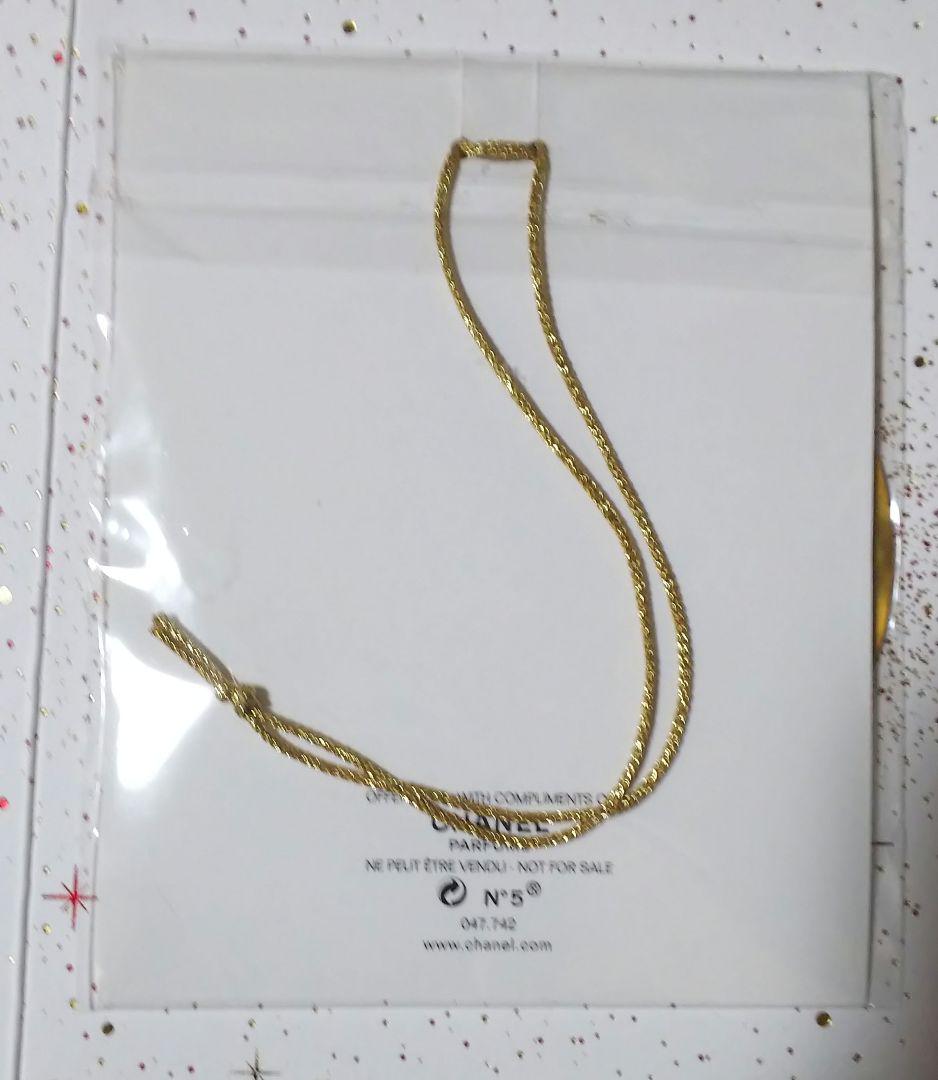 Chanel Seasonal gold Metal charm logo collectable