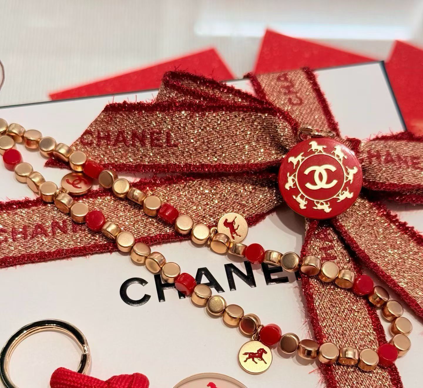 2026 Chanel Year of Horse bead phone strap with charm