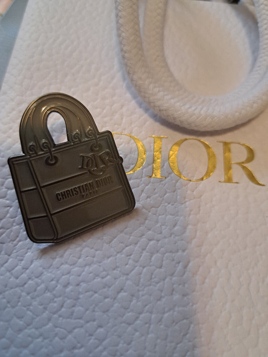 Dior Event Novelty Gift Metal Pin Badge Grey Collectable