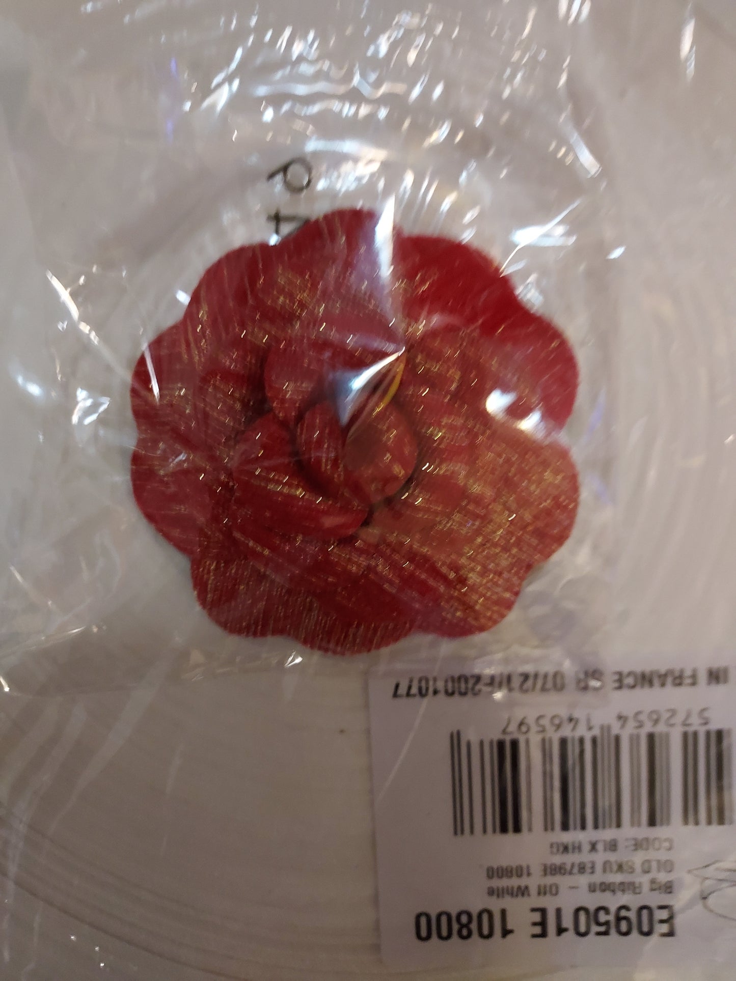 Chanel Holiday Red Gold Woven Camellia sticker from Beauty Counter