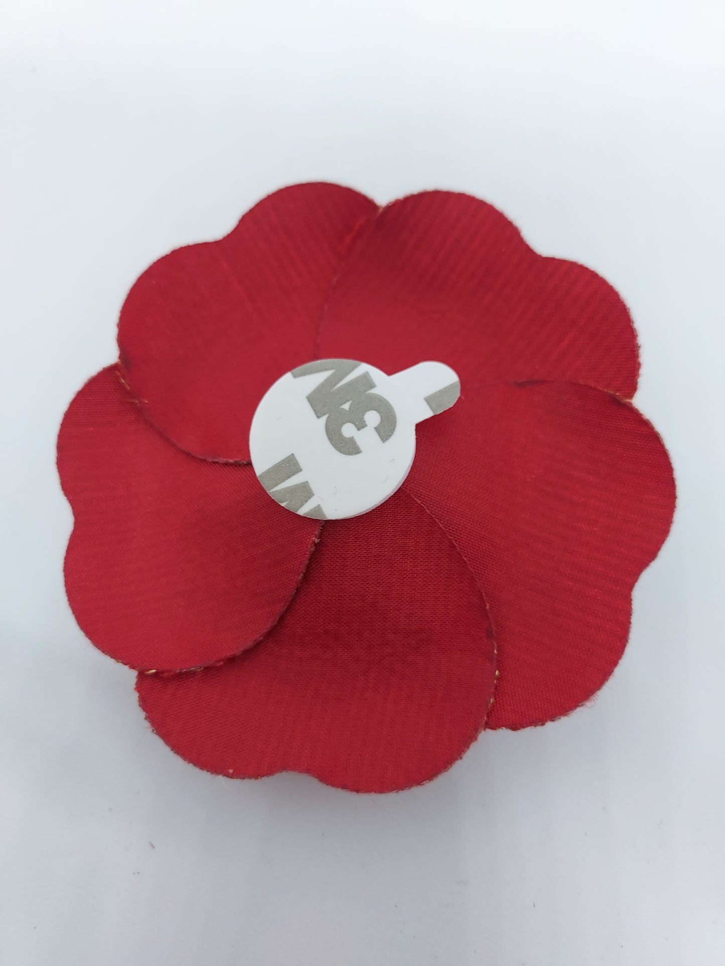 Chanel Holiday Red Gold Woven Camellia sticker from Beauty Counter