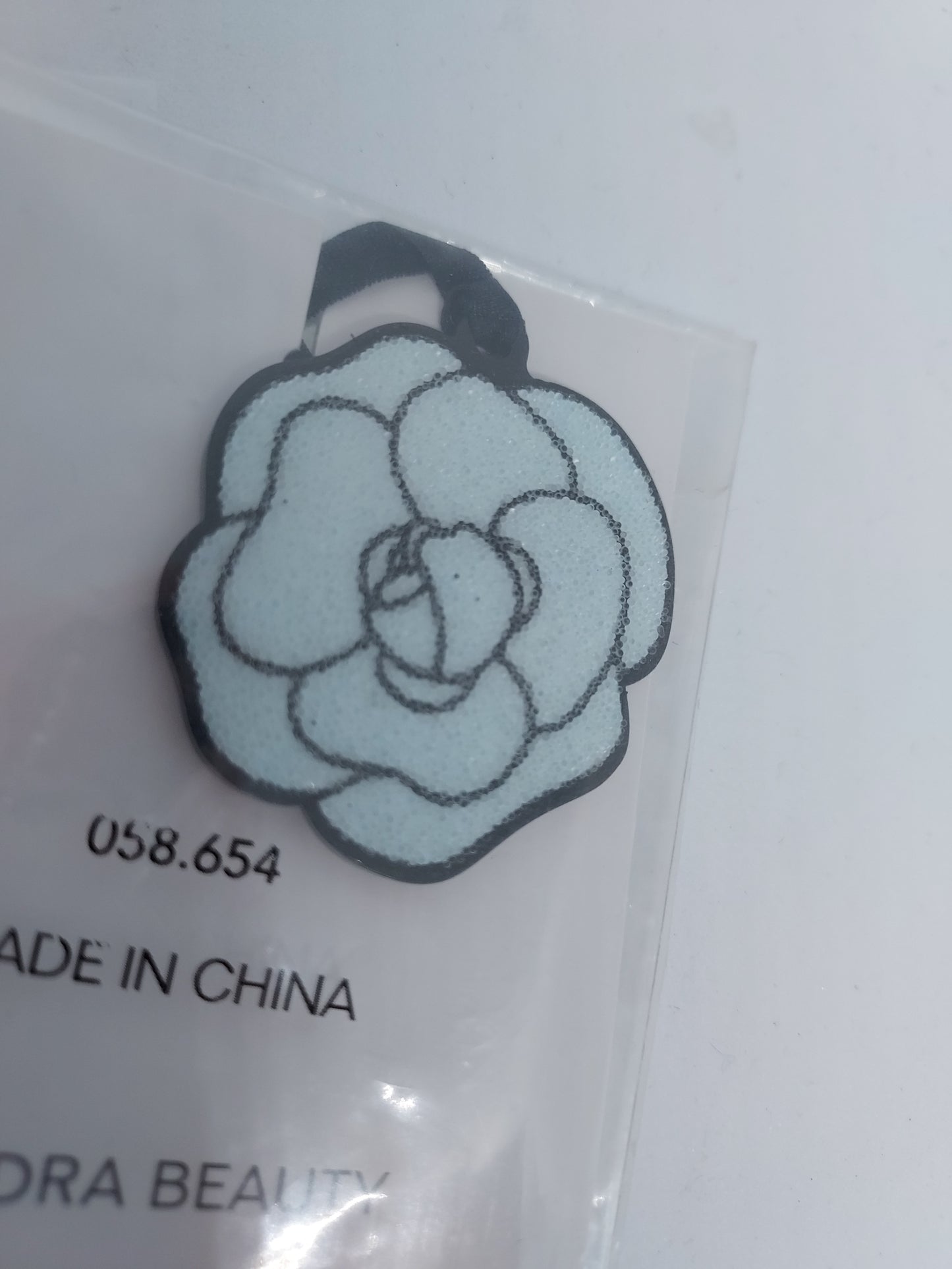 Hydra Beauty camellia light blue charm logo plastic collectable