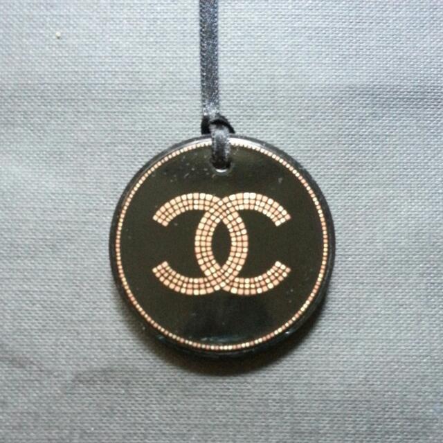 Chanel gold black charm logo plastic collectable