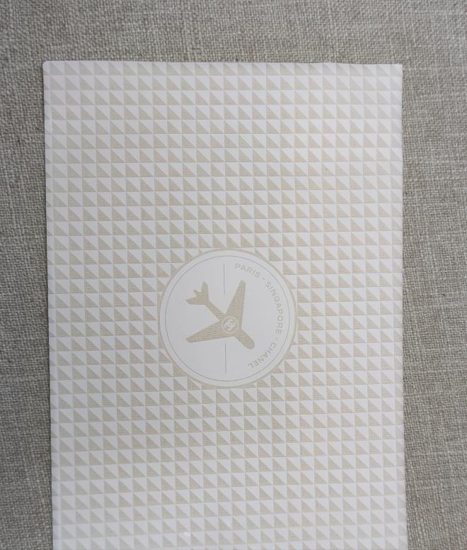 chanel singapore airpory ivory envelope small vinyl bag