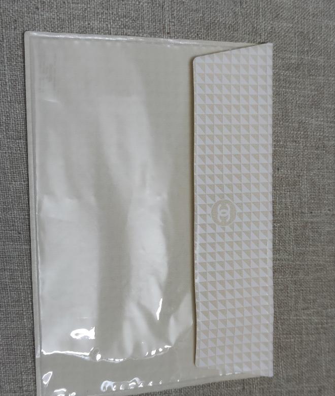 chanel singapore airpory ivory envelope small vinyl bag