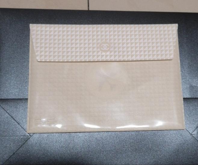 chanel singapore airpory ivory envelope small vinyl bag