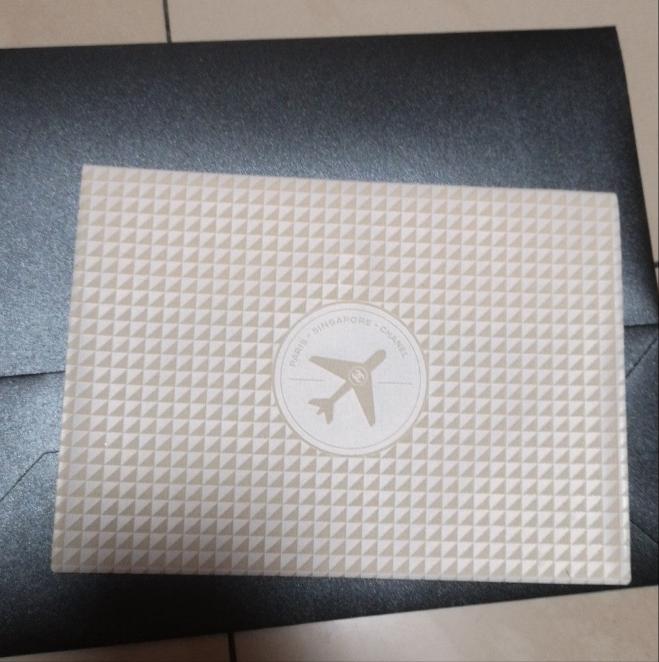 chanel singapore airpory ivory envelope small vinyl bag