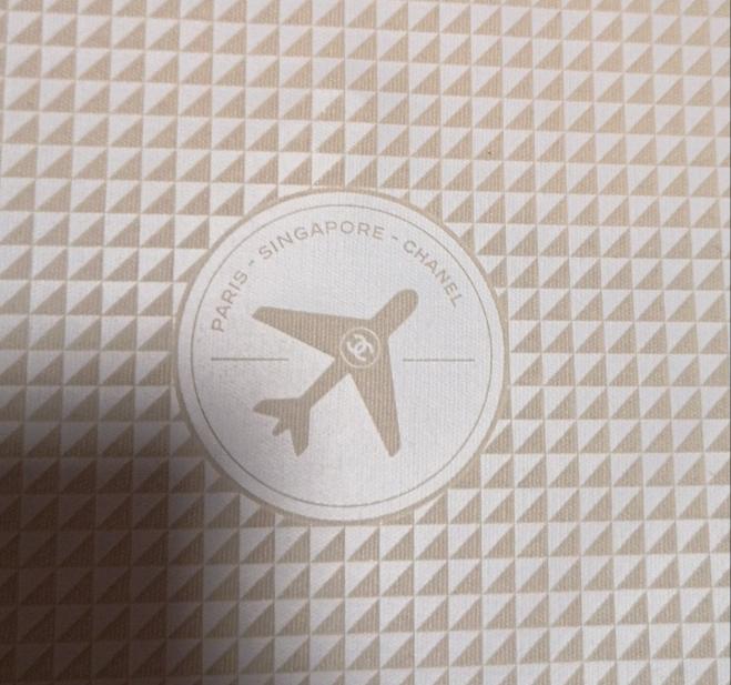 chanel singapore airpory ivory envelope small vinyl bag