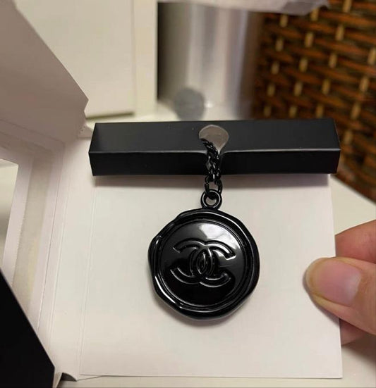 Chanel metal charm key chain