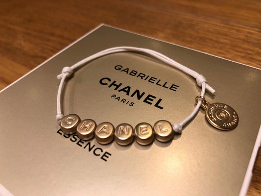 New Chanel Gabrielle gold tone bracelet charm