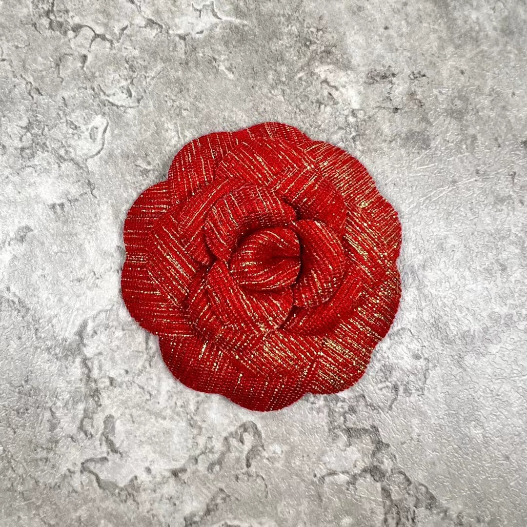 Chanel Holiday Red Gold Woven Camellia sticker from Beauty Counter