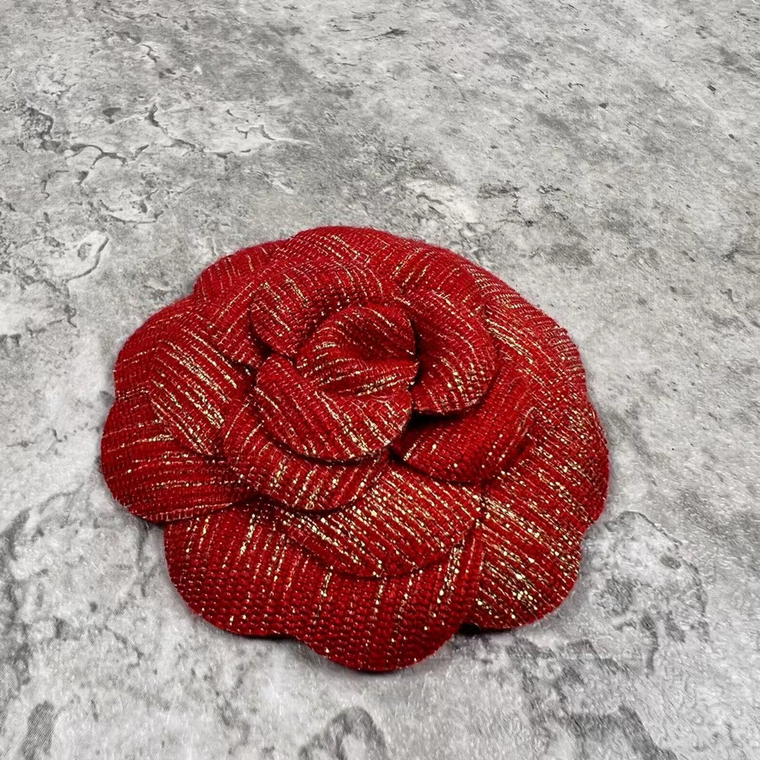 Chanel Holiday Red Gold Woven Camellia sticker from Beauty Counter