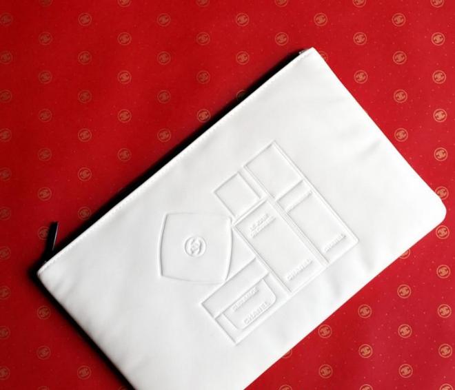 Chanel skincare White Embossed pouch bag in box